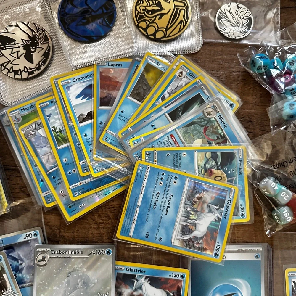 Pokemon Card Collection with Tins and Accessories 25 card Mystery Tin plus bonus
